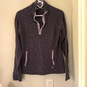 Dark purple half button down sweatshirt with kangaroo pouch and thumb holes